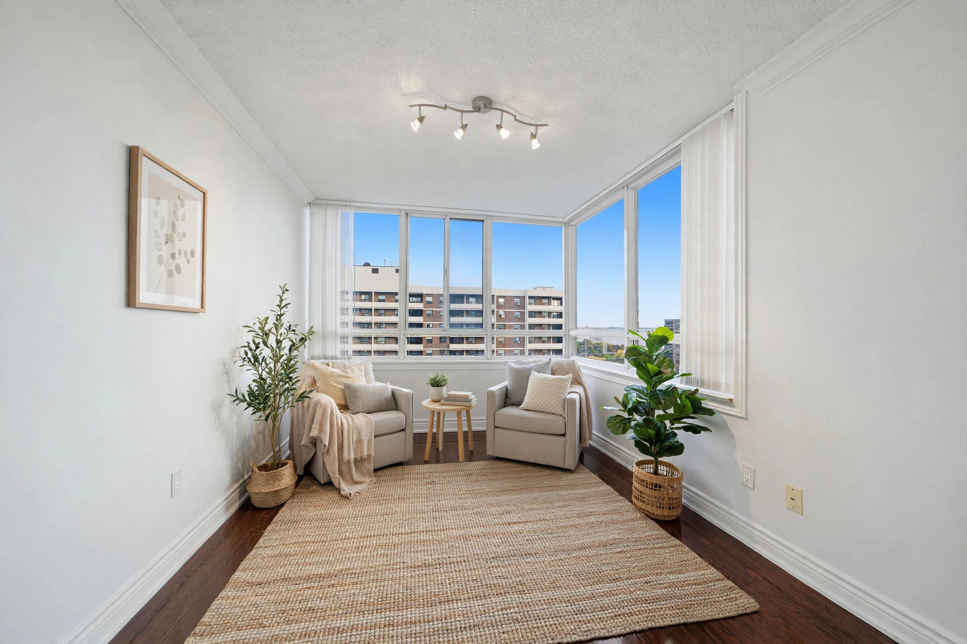 Virtually staged solarium with glass on every side at Suite 1401, 5 Lisa Street, Brampton