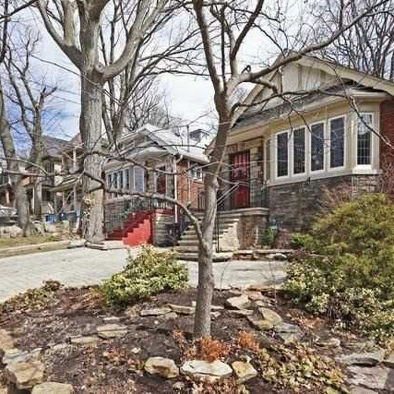 Detached brick bungalow at 17 Courcelette Road in Toronto