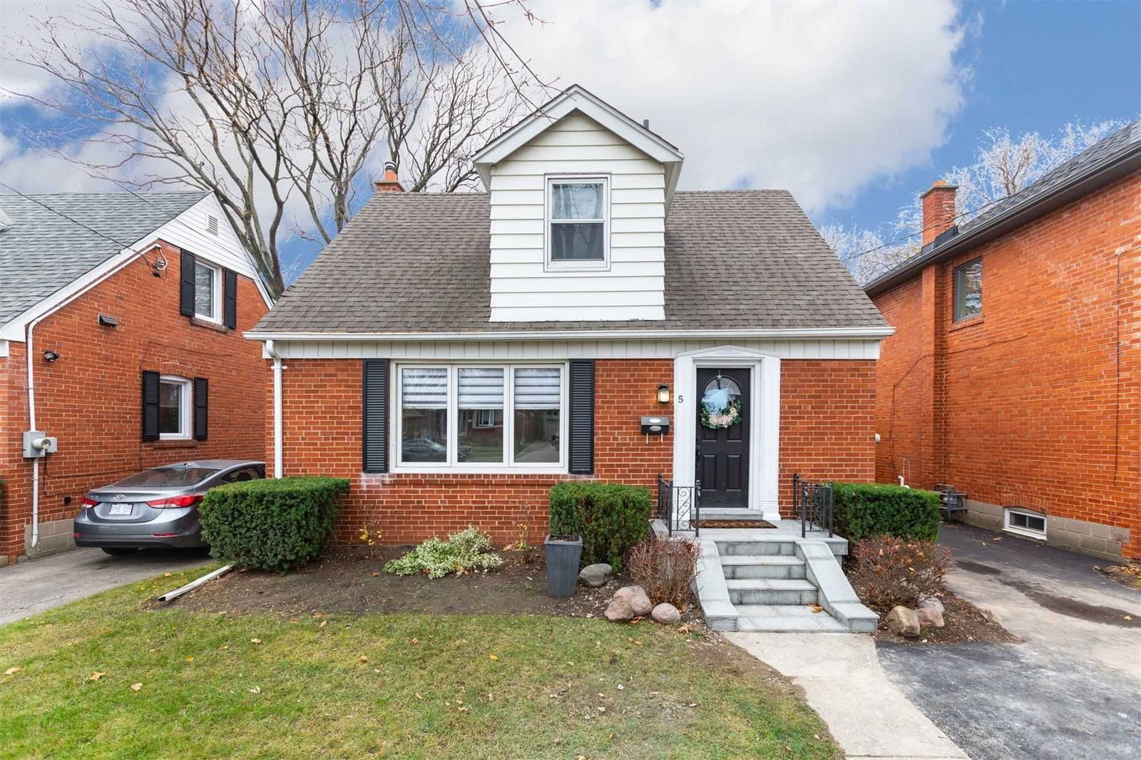 Brick 1.5-storey house at 5 Westleigh Crescent in Alderwood, Etobicoke