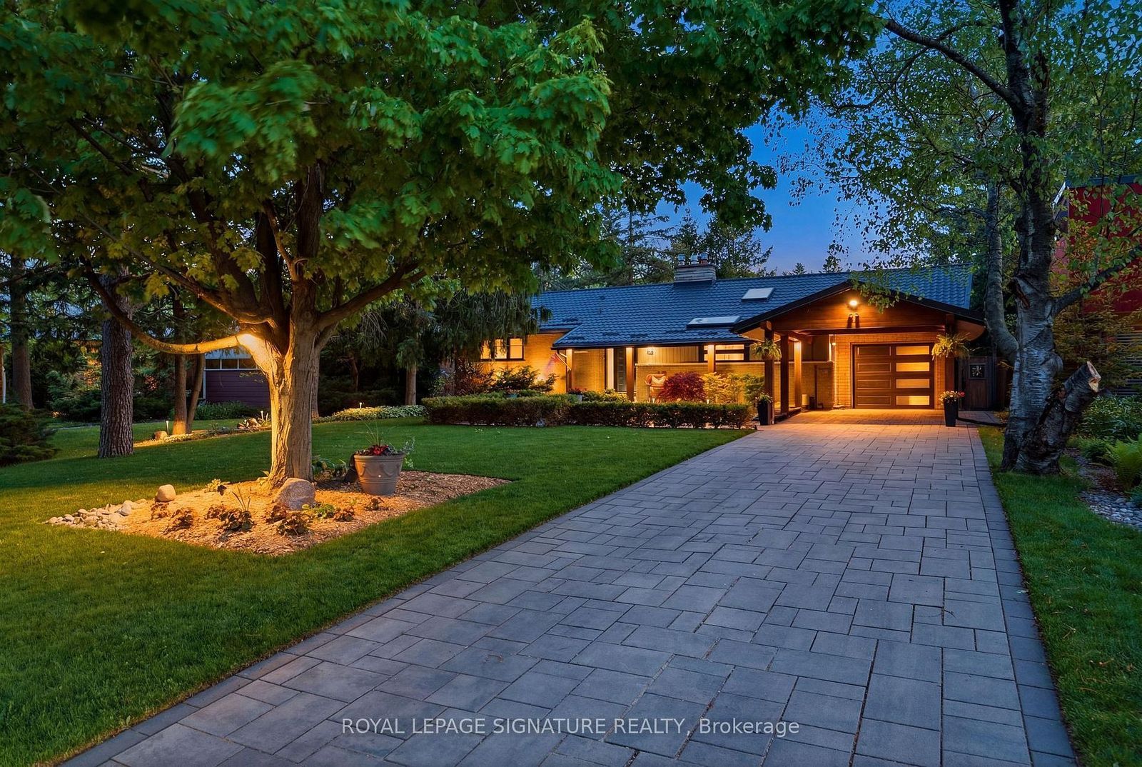 52 Morna Avenue custom bungalow at dusk in Guildwood, Scarborough