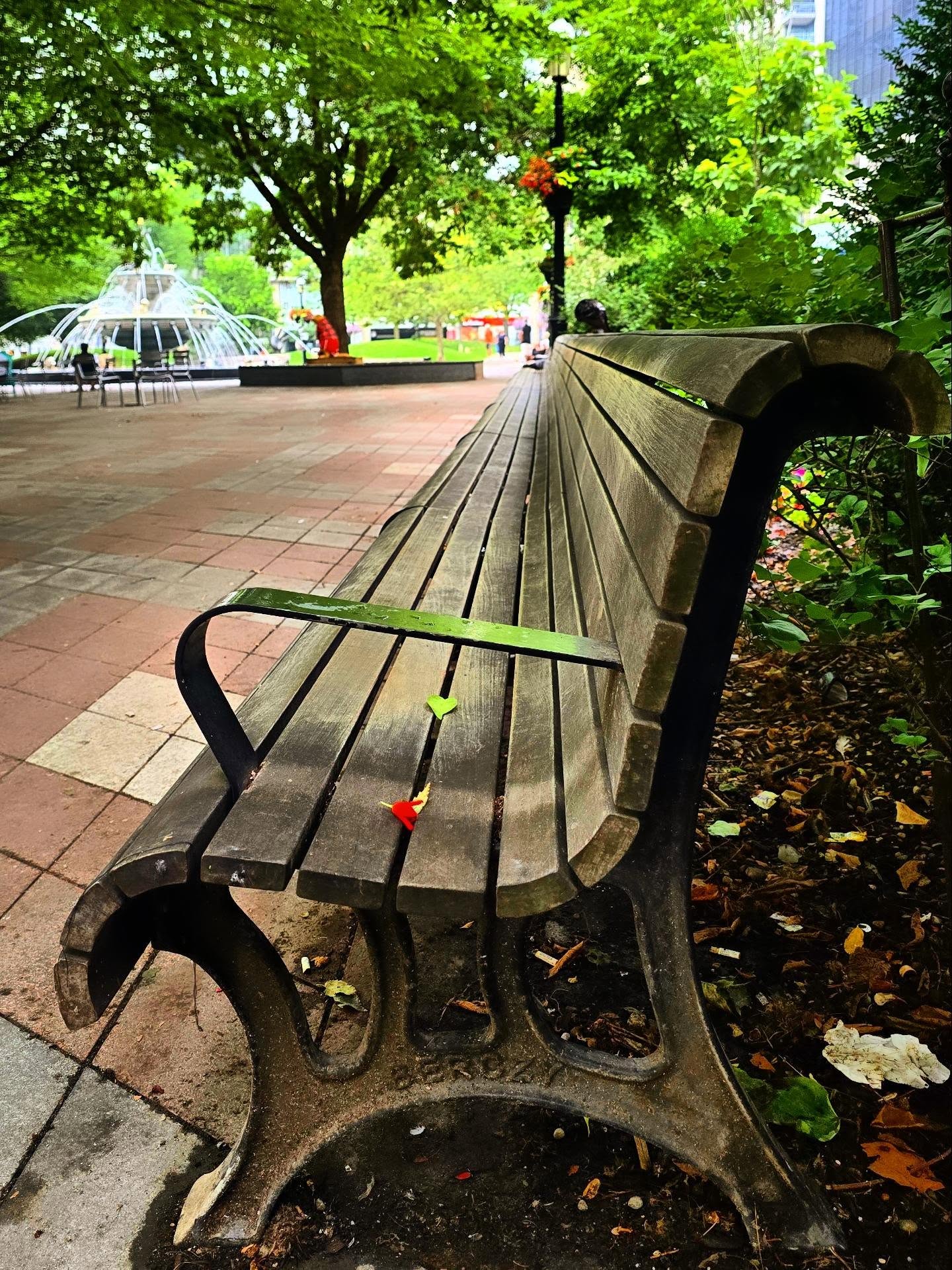 The long curved bench in Berczy Park, downtown Toronto