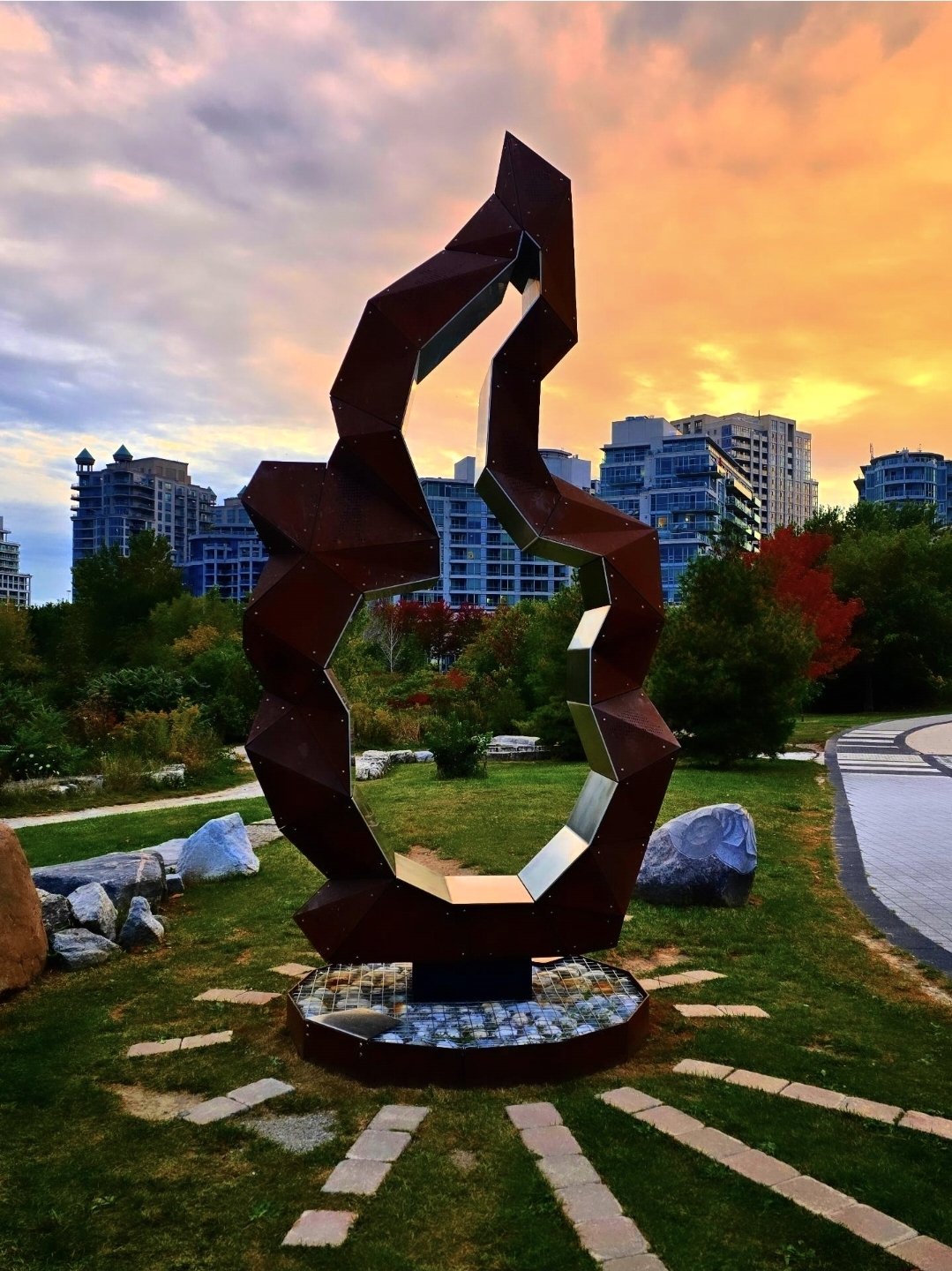 The Campfire sculpture at sunset in Humber Bay Shores, marking where the original Palace Pier stood