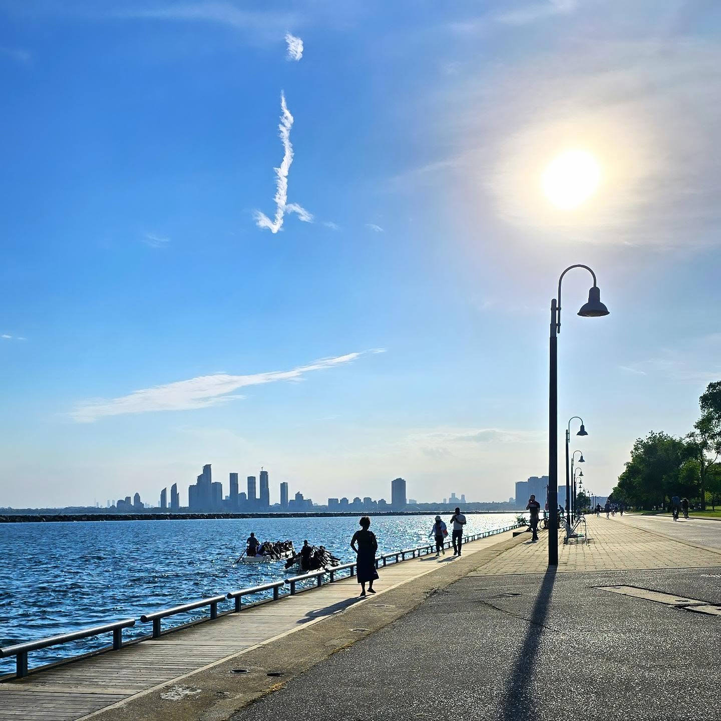 Dragon boats practicing on the water along the Martin Goodman Trail