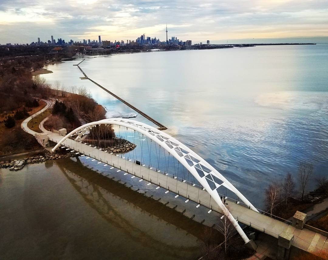 Aerial view of the Humber Bay Arch Bridge and Palace Pier condos