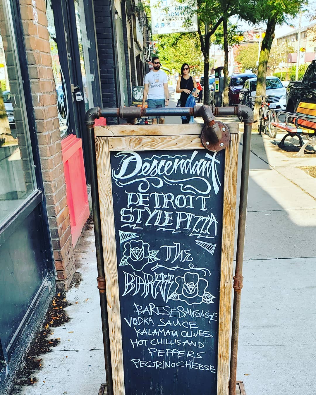Descendant Detroit Style Pizza chalkboard sign in Leslieville, Toronto