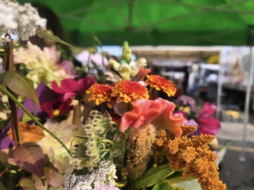 Fresh-cut fall flowers at a flower stall