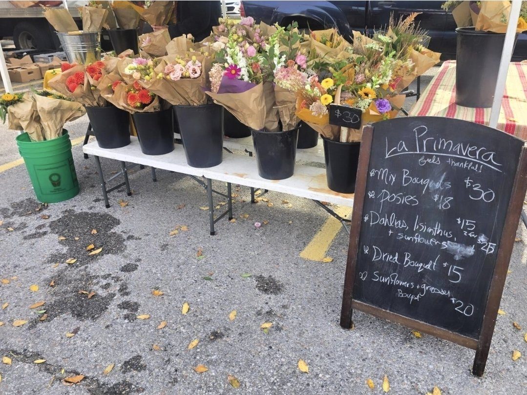 La Primavera flower stand with chalkboard price list