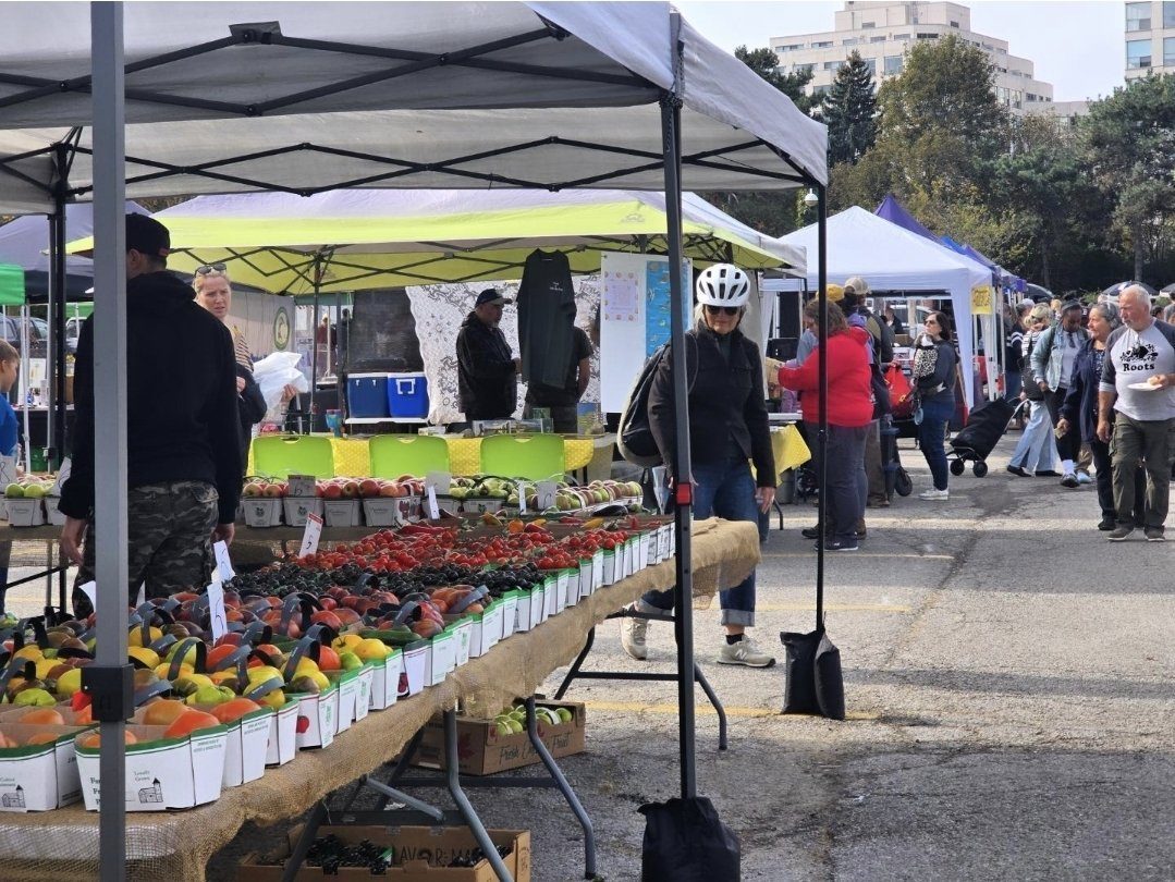 Farm stall with fresh berries and peppers at the Humber Bay Shores Farmers' Market
