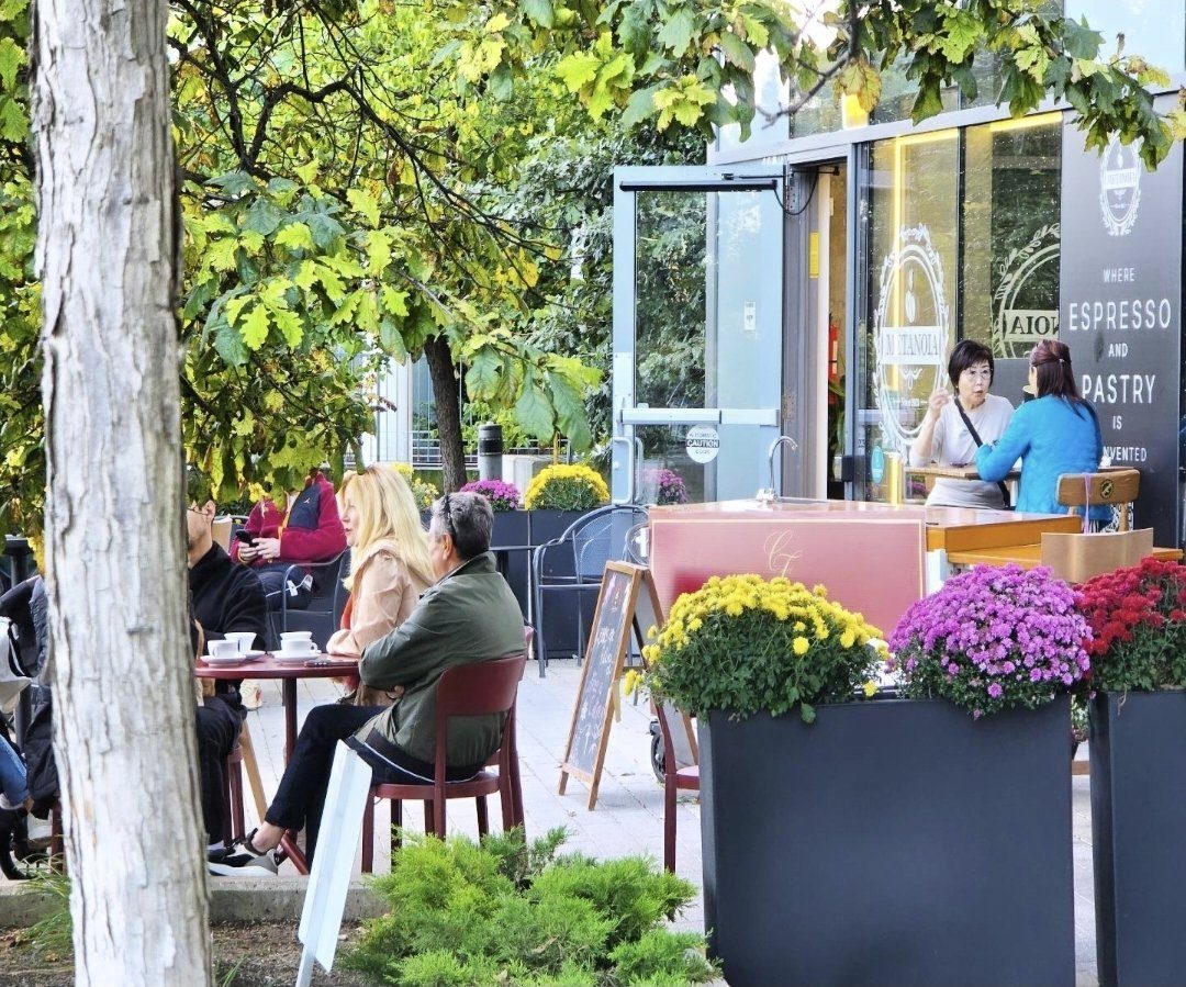 The terrace in front of Metanoia Caf&eacute; at Riva del Lago, 110 Marine Parade Drive &mdash; a community meeting point in Humber Bay Shores
