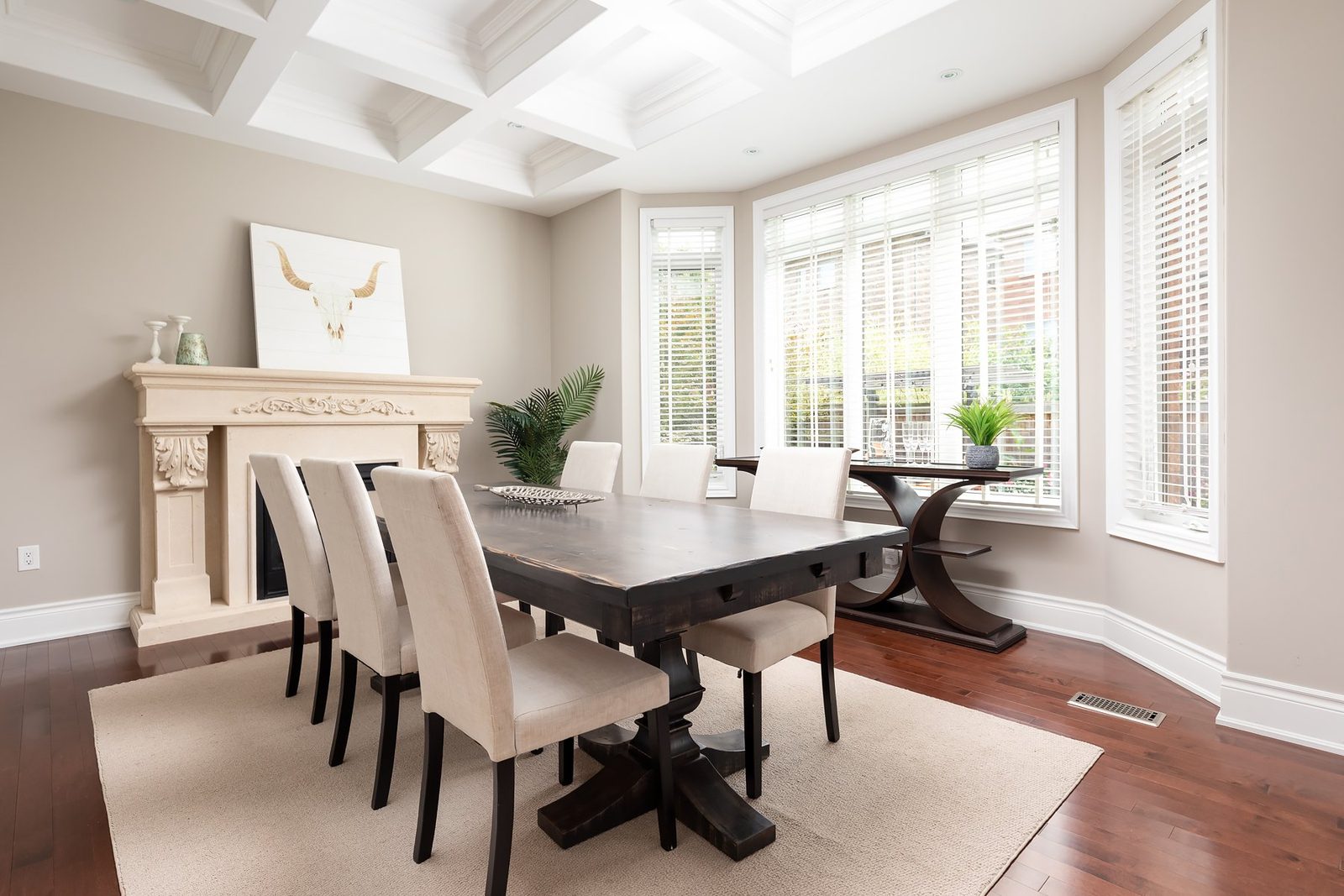 Staged dining room viewed from the far end at 33 Noce Way, Vaughan