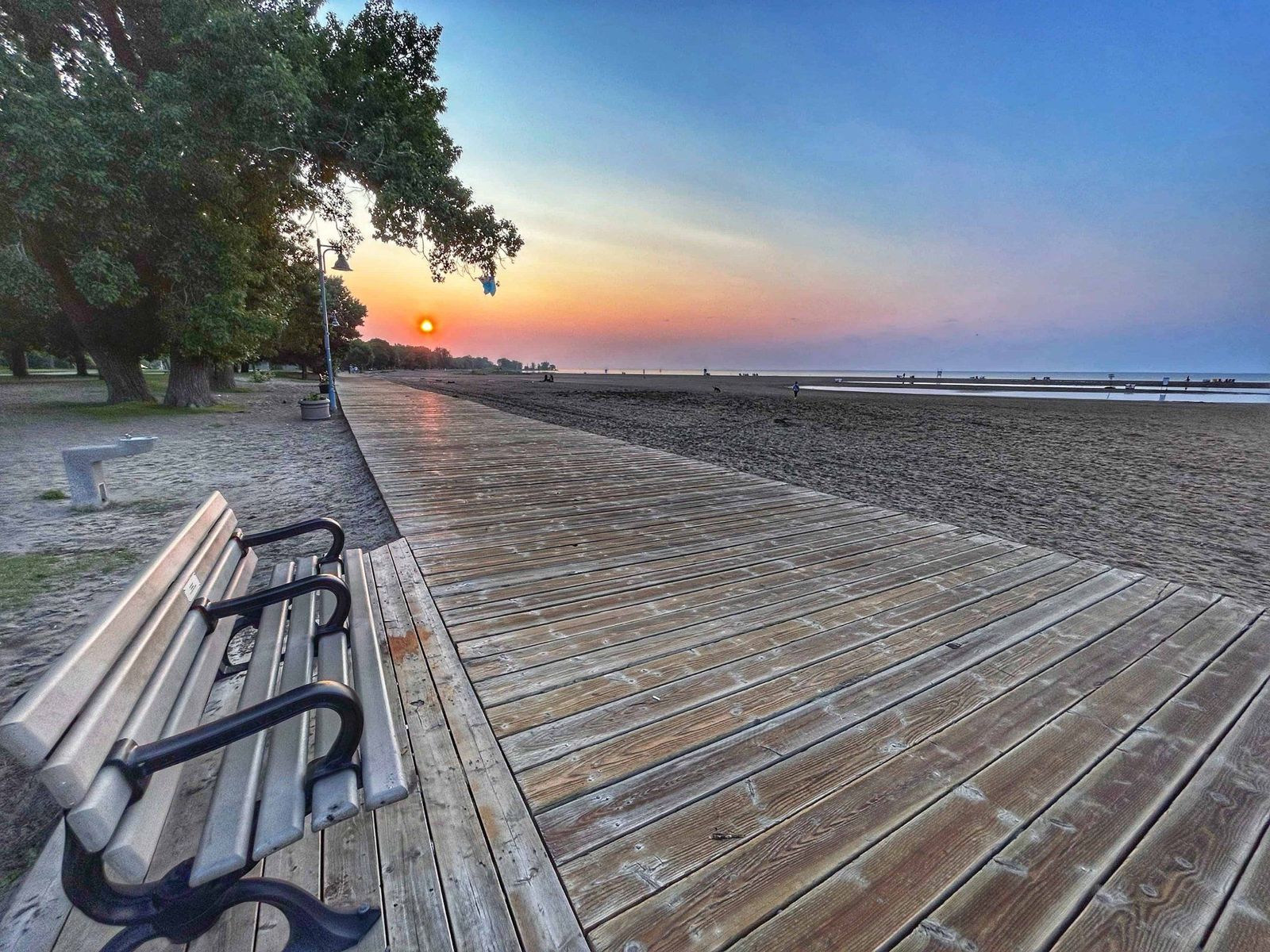 Sunrise over the wooden boardwalk at The Beach, Toronto