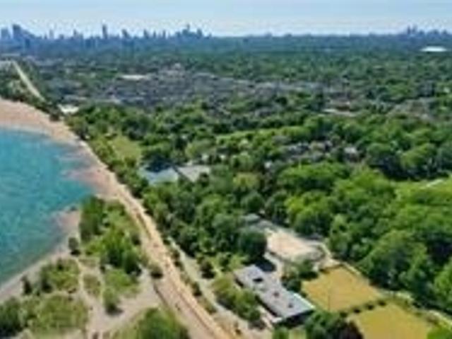 Aerial view of the Beaches shoreline with Lake Ontario and the Toronto skyline