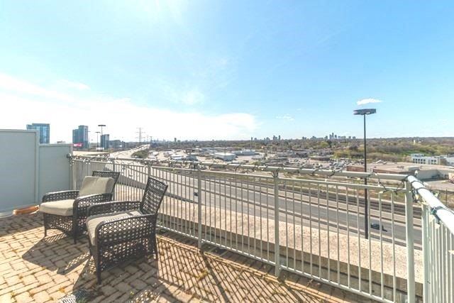 The private terrace at 1709 - 2111 Lake Shore Blvd W — seating with open city views