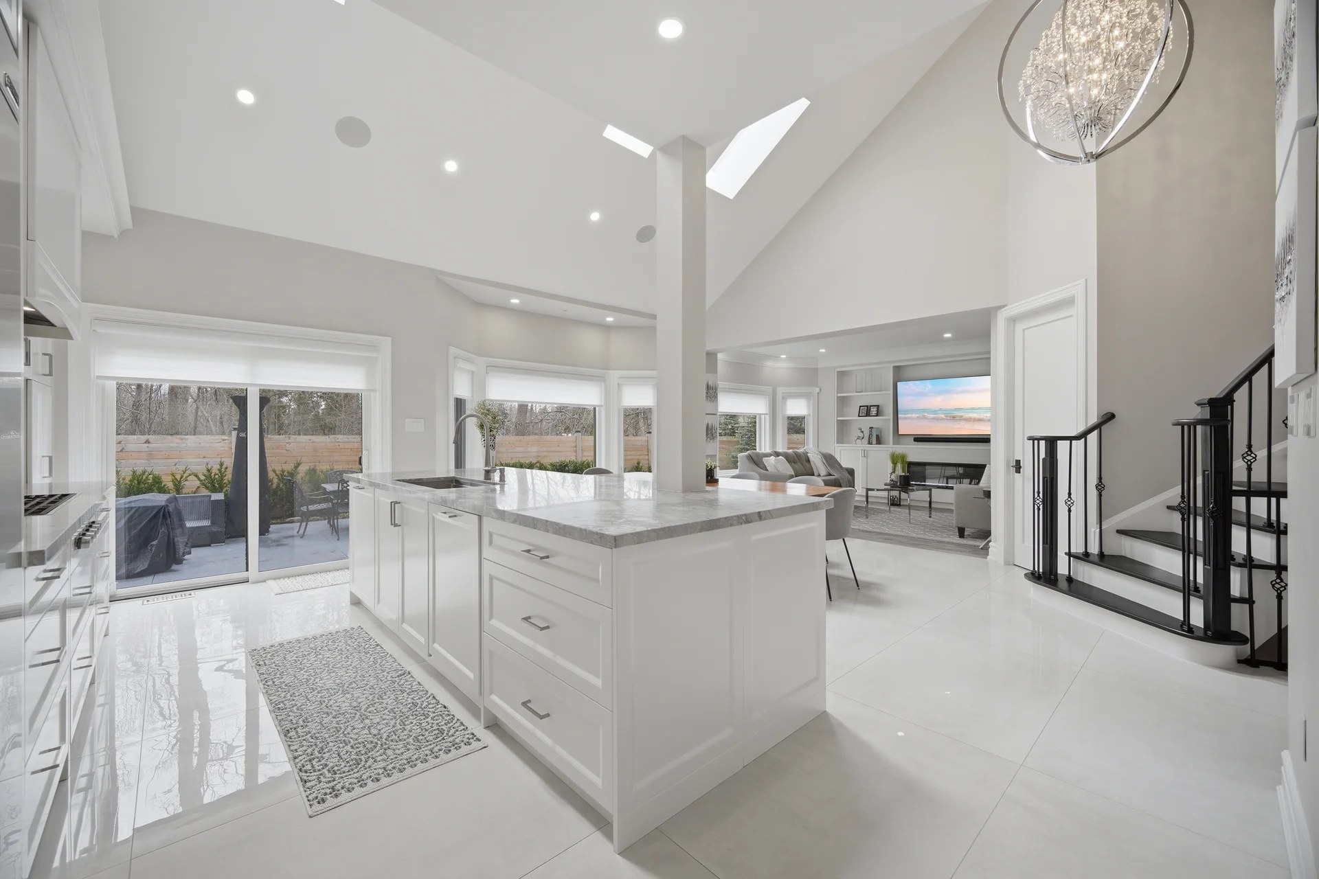 Island kitchen open to the family room at 61 Woodland Trail Court, Vaughan