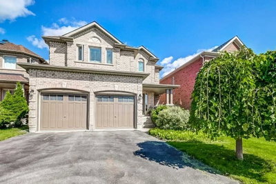 Front exterior of the all-brick detached 2-storey home at 81 Alamo Heights Drive, Richmond Hill, with attached 2-car garage